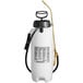 A white Chapin poly sprayer with a black handle and hose.