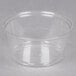 A Fabri-Kal clear plastic deli container with a clear lid.