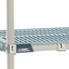 A MetroMax metal shelf with metal "S" hooks.