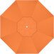 An orange umbrella with a white center.