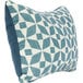 An Astella turquoise and petrol throw pillow with a blue and white geometric pattern.