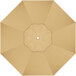 A top view of a tan California Umbrella with a hole in the center.