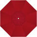 A red sunbrella canopy with a white center and a hole in the middle.