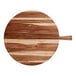 An Acacia wood round serving board with a handle.