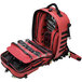 A red backpack with clear bags inside.