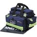 A navy blue Kemp USA professional trauma bag with a strap.