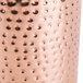 A copper-plated stainless steel wine cooler with a hammered texture.