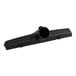 A black plastic nozzle with a tube and hole at the end.