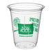 A clear plastic New Roots cold cup with green text.