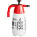 A white and red plastic Chapin handheld sprayer with a black handle.