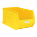 A yellow plastic storage bin with a white label holder and a Regency label insert.