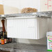 A Metro Super Erecta undershelf slide on a metal shelf.