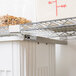 A Metro Super Erecta shelf with a bowl of cereal on it.