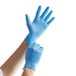 A pair of hands wearing blue Showa nitrile gloves.