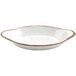 A white oval melamine side dish with a brown speckled rim.