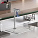 A stainless steel countertop with a Waterloo glass filler station with faucet.