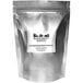 A silver bag of Dragon Fruit Powder with a white label.