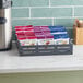 A Homefree variety pack of mini cookies on a tray on a counter.