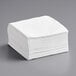 A stack of white premium 1/4 fold luncheon napkins.