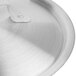 A Vollrath stainless steel lid on a metal pan.
