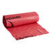 A roll of red plastic 44 gallon high density infectious waste bags.