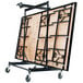 A National Public Seating stage dolly with a black metal frame.