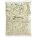 A white pouch of Kettle Collection Parmesan Spinach Artichoke Dip with green and white writing.