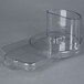 A clear plastic lid for a Waring commercial food processor.