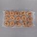 A plastic wrapped Original Bagel cinnamon raisin bagel