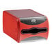 A red and black Tork countertop napkin dispenser.