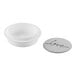 A white silicone baking mold kit with a stack of white objects.