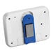 A white rectangular kitchen timer with a blue rectangular object on it.