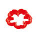 A red cookie cutter with four leaves.