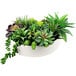 A white ceramic bowl with artificial succulents in it.