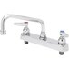 A T&S chrome deck mount faucet with a lever handle and swing nozzle.