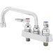 A T&S chrome deck-mount faucet with lever handles.
