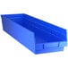 A Regency blue plastic shelf bin with a handle.