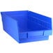 A Regency blue plastic shelf bin with a handle.