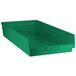 A green plastic rectangular Regency shelf bin.