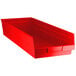 A red plastic Regency shelf bin with a handle.