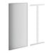 A white rectangular object with a metal frame.