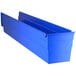 A Regency blue plastic shelf bin with open compartments.