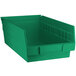 A green plastic Regency shelf bin.