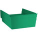 A green Regency plastic shelf bin.