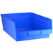 A blue plastic Regency shelf bin.