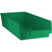 A green plastic Regency shelf bin.