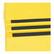 A yellow polyethylene step stool with black stripes on the top step.