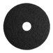 A white circle with a black circular object in the middle.