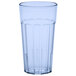 A clear plastic tumbler with a blue rim.