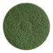 A green circular Lavex Basics floor pad with a circle in the middle.